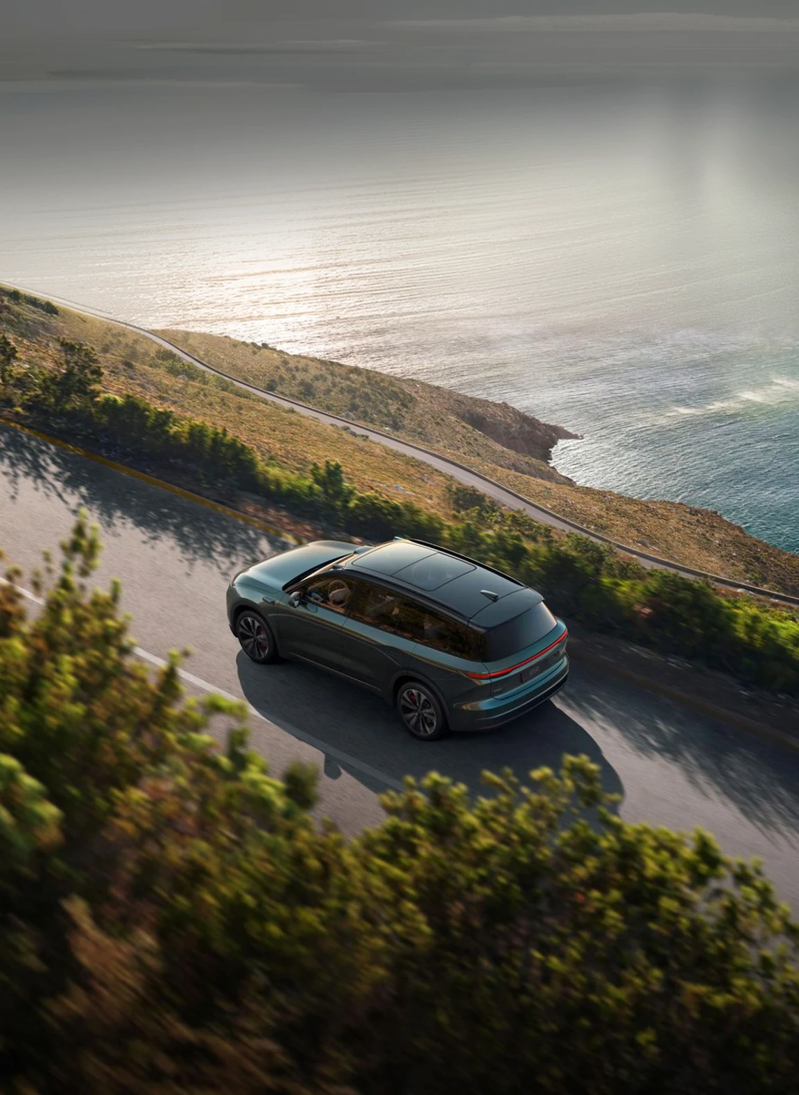 Fleet vehicle on a coastal highway